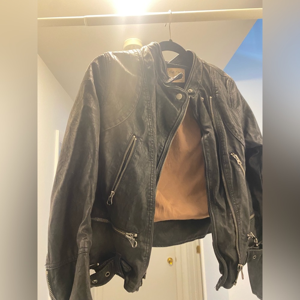 Free people worn leather jacket.